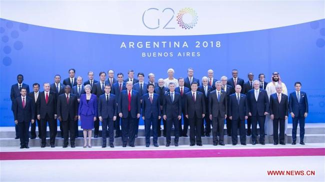 Chinese President Xi Jinping (6th R, front) poses for a group photo with other leaders attending the 13th summit of the Group of 20 (G20) in Buenos Aires, Argentina, Nov. 30, 2018. [Photo:Xinhua]