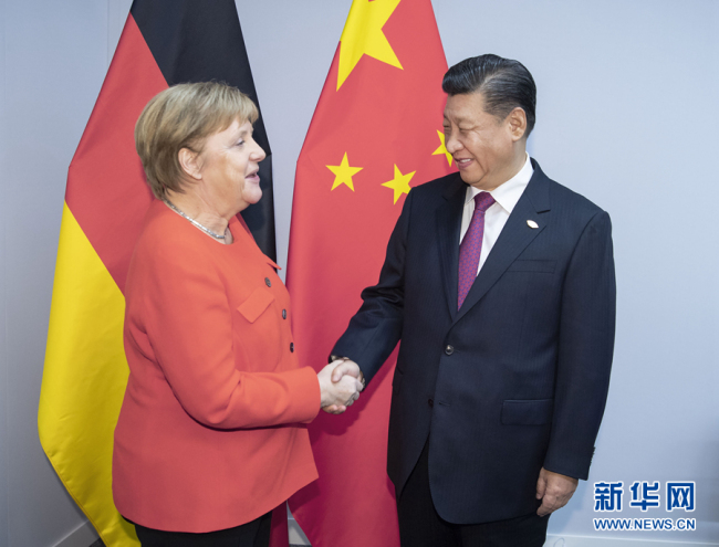 Chinese President Xi Jinping (R) meets with German Chancellor Angela Merkel on the sidelines of the 13th summit of the G20 in the Argentine capital, Buenos Aires, Saturday, December 1, 2018. [Photo: Xinhua]