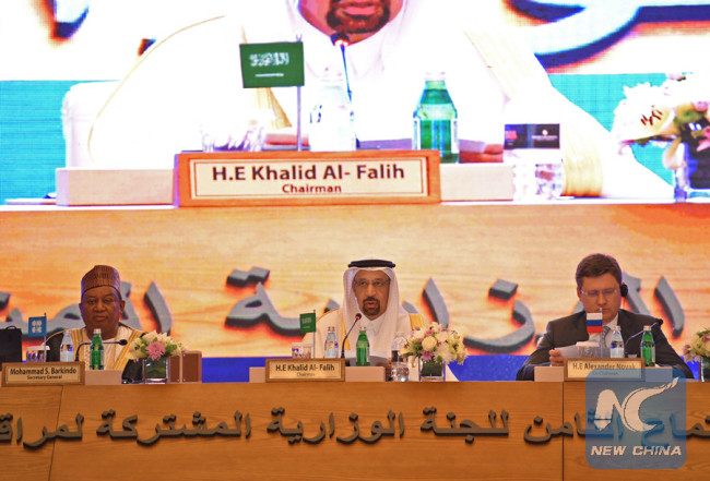Organization of Petroleum Exporting Countries (OPEC) secretary general Mohammed Barkindo (L), Saudi Energy Minister Khaled al-Faleh (C) and Russian Energy Minister Alexander Novak (R) attend a meeting of OPEC and non-OPEC members to assess compliance with production cuts and to discuss potential long-term cooperation, in Jeddah on April 20, 2018.[Photo: AP]