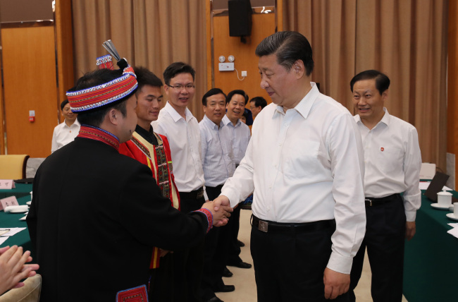 Chinese President Xi Jinping meets local representatives in Nanning, capital of the Guangxi Zhuang Autonomous Region in southern China, April 20, 2017. [Photo: Xinhua]