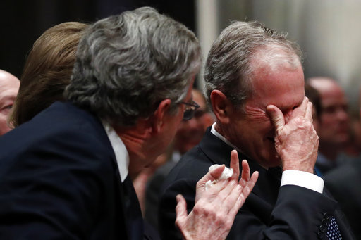 Former President George W. Bush, right, cries after speaking during the State Funeral for his father, former President George H.W. Bush, at the National Cathedral, Wednesday, Dec. 5, 2018, in Washington.[Photo: AP]