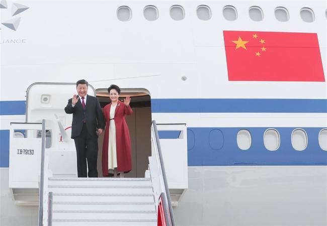 Chinese President Xi Jinping and his wife, Peng Liyuan, disembark from the plane in Madrid, Spain, Nov. 27, 2018. [File photo: Xinhua/Xie Huanchi]