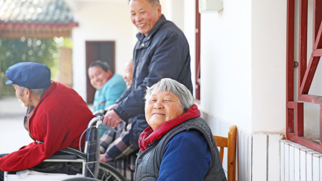 A government-run nursing home in Guang'an district has so far helped four families to leave poverty behind, and has helped bring a greater sense of happiness back into the lives.[Photo: ChinaPlus/Zhao Feiyu]
