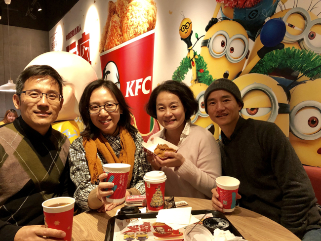 The author (left) together with her classmates Guan, Yin and Liang at the KFC store in Qianmen, Beijing, December 8, 2018.[Photo: China Plus]