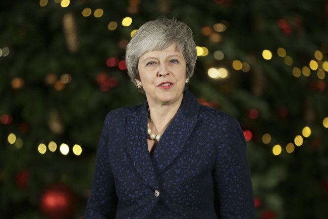 British Prime Minister Theresa May makes a statement outside 10 Downing Street, in London, Wednesday December 12, 2018. [Photo: AP/Tim Ireland]