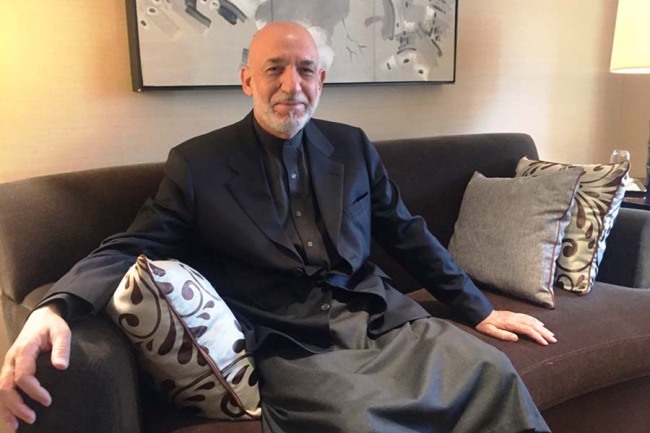 Former Afghanistan President Hamid Karzai speaks with CRI in Beijing on Dec 12, 201 8after the Imperial Springs International Forum. [Photo: China Plus]