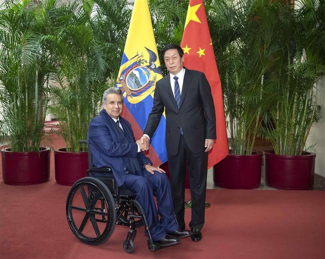 Li Zhanshu (R), chairman of the National People's Congress (NPC) Standing Committee, meets with visiting Ecuadorian President Lenin Moreno at the Great Hall of the People in Beijing, capital of China, Dec. 13, 2018. [Photo: Xinhua]