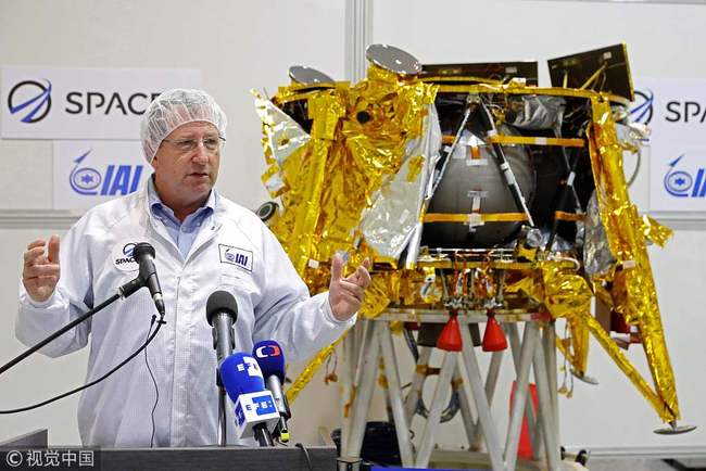 Israeli Aerospace Industries director of Space division Opher Doron speaks during the presentation to the medias of the "Time capsule" intended to travel to the moon on early 2019 with the Space IL and Israeli Aerospace Industries spacecraft, in Yehud, Eastern Tel Aviv, on December 17, 2018. [Photo: VCG/JACK GUEZ]