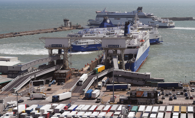 Lorries disembark from ferries in Dover, south east of London, Britain, August 4, 2015. The British government has chartered ferries to deal with the possibility of an unregulated exit from the European Union. [File photo: IC/EPA/Andy Rain]