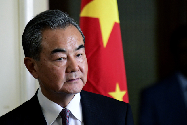 Chinese State Councilor and Foreign Minister Wang Yi looks on as he addresses media representatives during a press conference alongside his Senegalese counterpart at The Foreign Ministry in Dakar on January 6, 2019. [Photo: Seyllou/AFP]