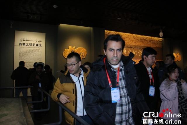Journalists visit the Xinjiang Museum on January 9, 2019, as part of the seventh "Silk Road Celebrity Tour". [Photo: China Plus]