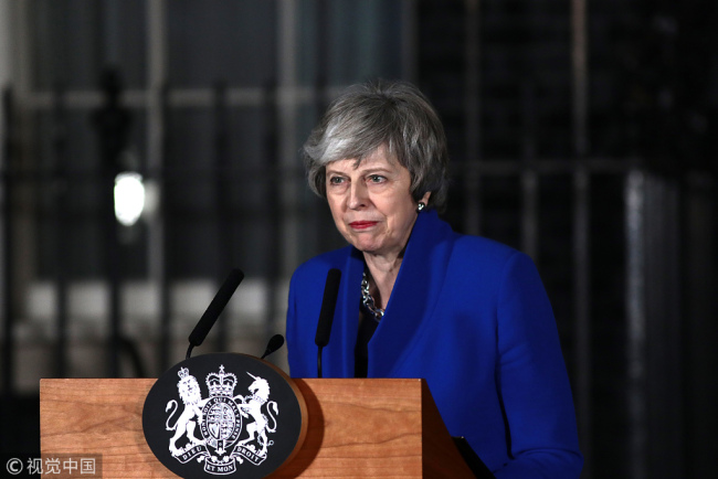 British Prime Minister Theresa May addresses the media at number 10 Downing street after her government defeated a vote of no confidence in the House of Commons on January 16, 2019 in London, England. [Photo: VCG]