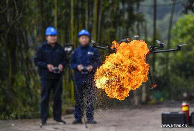 A flame-spurting drone is seen during a demonstration in Chongqing, southwest China, Jan. 16, 2019. [Photo: Xinhua]