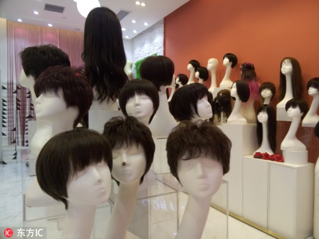 Human hair sold at a store in Shenzhen, November 11, 2018. [File photo: IC]