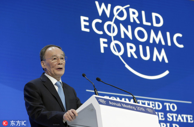 Chinese Vice President Wang Qishan addresses the annual meeting of the World Economic Forum in Davos, Switzerland on Wednesday, January 23, 2019. [Photo: IC]