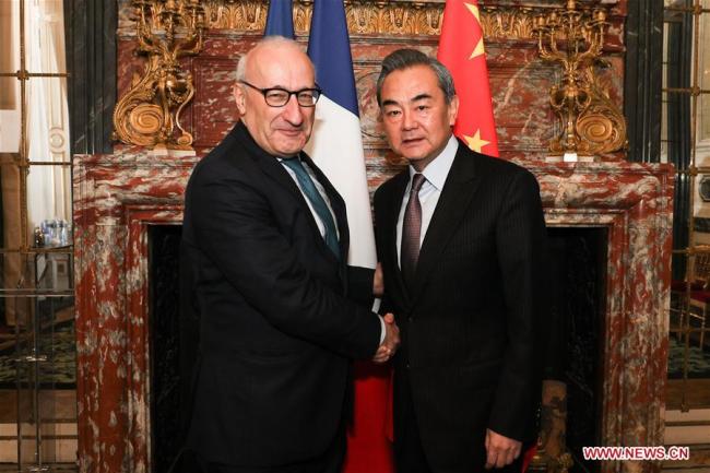Chinese State Councilor and Foreign Minister Wang Yi (R), who is currently in France for the 18th consultation of the coordinators for the China-France Strategic Dialogue, meets with Philippe Etienne, diplomatic adviser to the French President at the Elysee Palace, in Paris, France, Jan. 24, 2019. [Photo: Xinhua]
