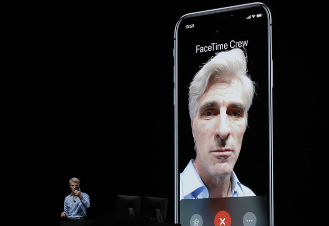 In this June 4, 2018 file photo, Craig Federighi, Apple's senior vice president of Software Engineering, speaks about group FaceTime during an announcement of new products at the Apple Worldwide Developers Conference in San Jose, Calif. Apple says it has fixed the internal bug that led to people being able to eavesdrop on others while using its group video chat feature. It plans to turn the service back on next week via a software update. The bug allowed many iPhone users to turn an iPhone into a live microphone while using Group FaceTime. [File photo: AP/Marcio Jose Sanchez]