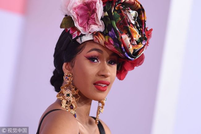 In this file photo taken on October 9, 2018, US rapper Cardi B arrives at the 2018 American Music Awards in Los Angeles, California. [File Photo: vcg.com]