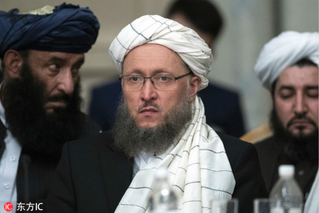 Taliban official Abdul Salam Hanafi, center, attends the "intra-Afghan" talks in Moscow, Russia, Wednesday, Feb. 6, 2019. [Photo: IC]