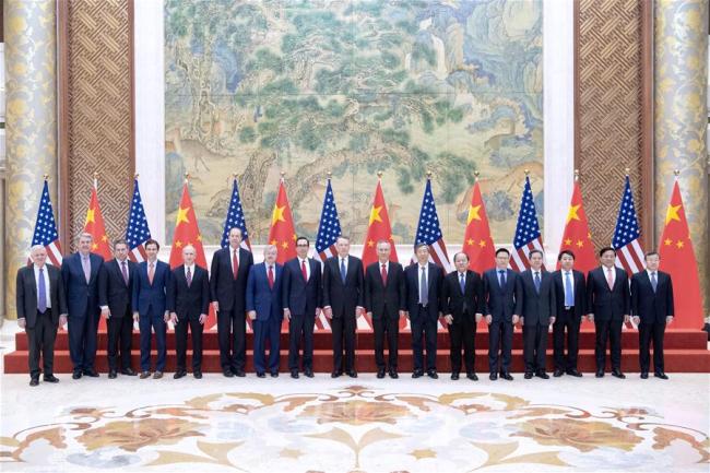 Delegates to the China-U.S. high-level economic and trade consultations pose for a group photo in Beijing, Feb. 15, 2019.  [Photo: Xinhua]
