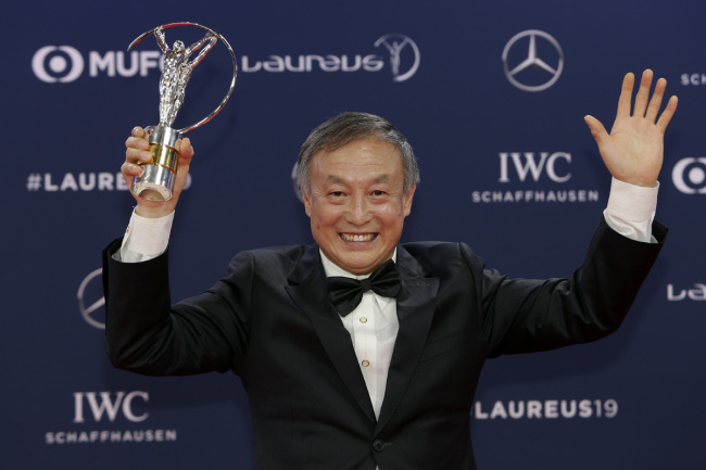 China's Xia Boyu, a double amputee who climbed Mount Everest, winner of the Laureus Sporting Moment of the Year celebrates at the 2019 Laureus World Sports Awards, Monday, Feb. 18, 2019. [Photo: AP]