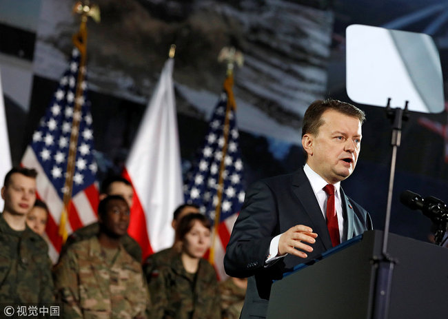 Polish Defense Minister Mariusz Blaszczak speaks during U.S. Vice President Mike Pence's arrival in Warsaw, Poland, February 13, 2019. [Photo: VCG]