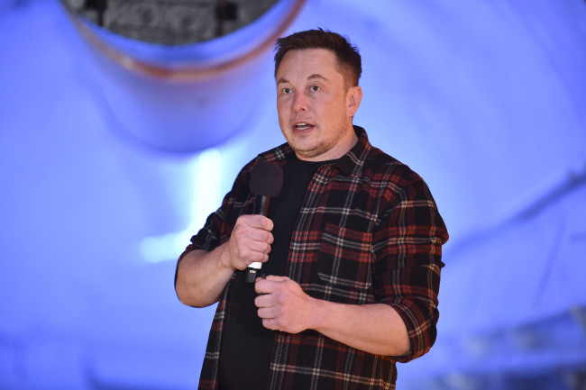 Elon Musk, co-founder and chief executive officer of Tesla Inc., speaks during an unveiling event for the Boring Co. Hawthorne test tunnel in Hawthorne, Calif., Tuesday, Dec. 18, 2018. [File Photo: AP/ Robyn Beck]