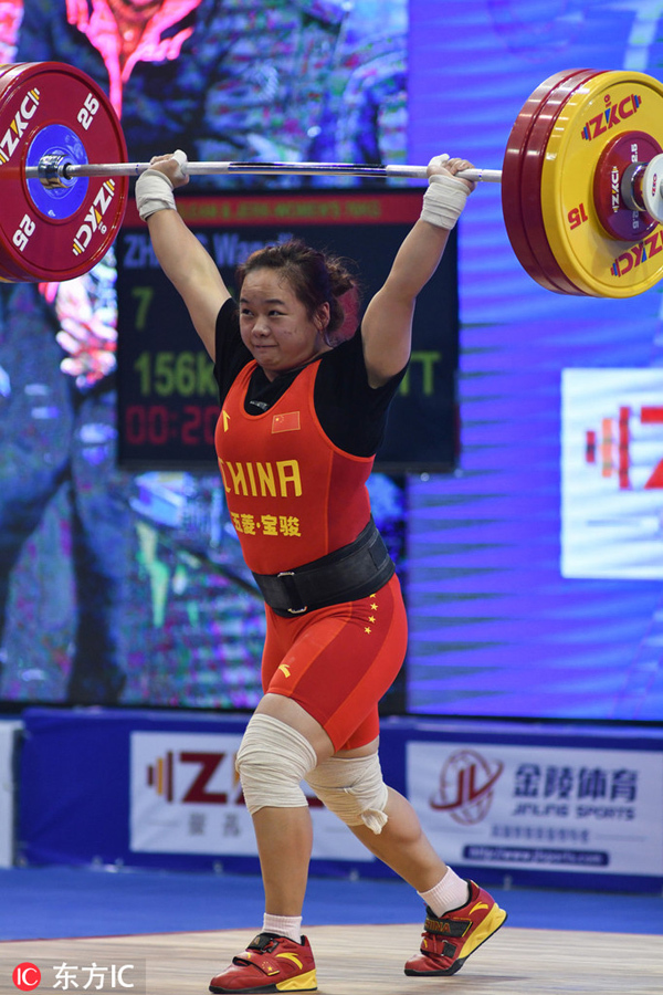 Zhang Wangli made a successful raise of world record breaking 156kg in her third attempt in the clean and jerk section competition at the IWF World Cup in Fuzhou on Feb 26, 2019. [Photo: IC]