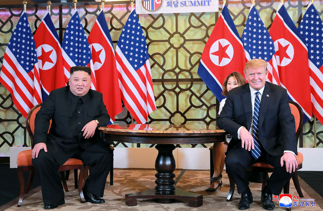 This picture from DPRK's official Korean Central News Agency (KCNA) taken on February 28, 2019 and released on March 1, 2019 shows DPRK’s leader Kim Jong Un (L) sitting with US President Donald Trump at the Sofitel Legend Metropole hotel in Hanoi. [Photo: AFP/KCNA]