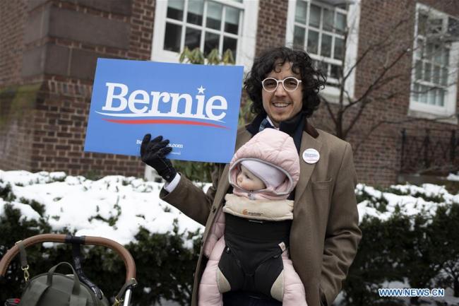 A supporter attends U.S. Senator Bernie Sanders' first presidential campaign rally in Brooklyn College, New York, the United States, March 2, 2019. [Photo: Xinhua]