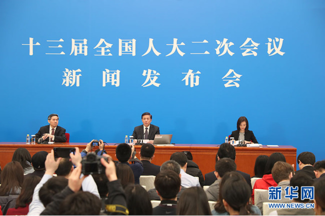 Zhang Yesui, the spokesperson for the second session of the 13th National People's Congress, delivers a speech at a press conference on Monday. [Photo: Xinhua]