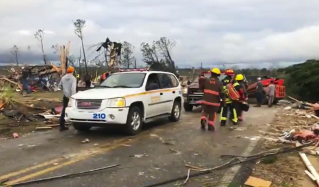 Emergency responders work in the scene amid debris in Lee County, Ala., after what appeared to be a tornado struck in the area Sunday, March 3, 2019. [Photo: AP]