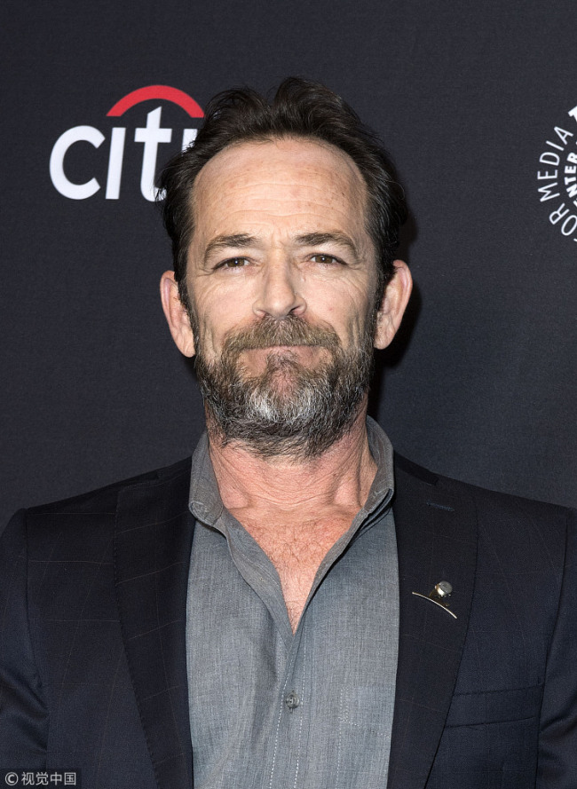 Actor Luke Perry attends The 2018 PaleyFest screening of "Riverdale" at the Dolby Theater on March 25, 2018 in Hollywood, California. [Photo: VCG]