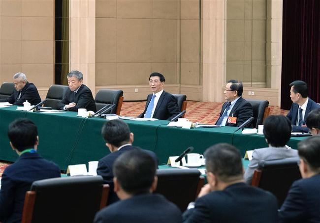 Wang Huning, a member of the Standing Committee of the Political Bureau of the Communist Party of China (CPC) Central Committee and a member of the Secretariat of the CPC Central Committee, joins a panel discussion with political advisors from the sectors of social welfare and security and specially invited political advisors at the second session of the 13th National Committee of the Chinese People's Political Consultative Conference (CPPCC) in Beijing, capital of China, March 4, 2019. [Photo: Xinhua/Shen Hong]