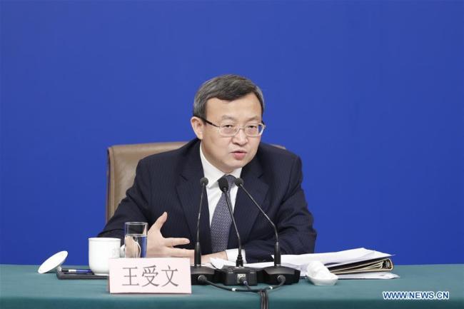 Vice Minister of Commerce and Deputy China International Trade Representative Wang Shouwen attends a press conference on China's domestic market and all-round opening-up for the second session of the 13th National People's Congress (NPC) in Beijing, capital of China, March 9, 2019. [Photo: Xinhua/Shen Bohan]