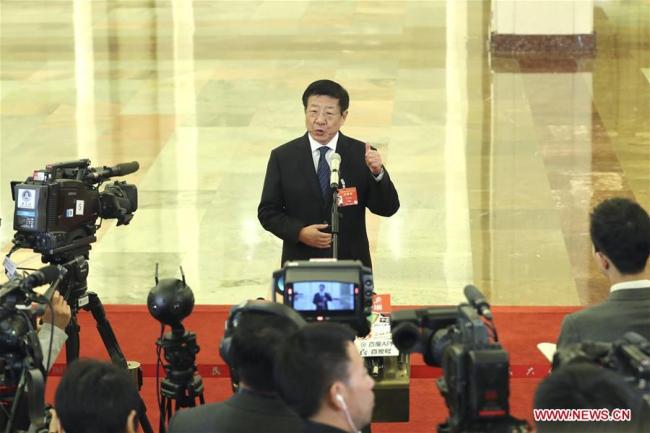 Zhang Jianlong, director of the National Forestry and Grassland Administration, is interviewed before the third plenary meeting of the second session of the 13th National People's Congress (NPC) at the Great Hall of the People in Beijing, China on March 12, 2019. [Photo: Xinhua/Yin Gang]