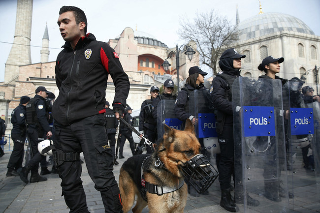 Backdropped by the Byzantine-era Hagia Sophia, Turkish police officers provide security during a protest against the mosque attacks in New Zealand in Istanbul, Saturday, March 16, 2019. World leaders expressed condolences and condemnation following the deadly attacks on mosques in the New Zealand city of Christchurch, while Muslim leaders said the mass shooting was evidence of a rising tide of violent anti-Islam sentiment. [Photo: AP/Lefteris Pitarakis]