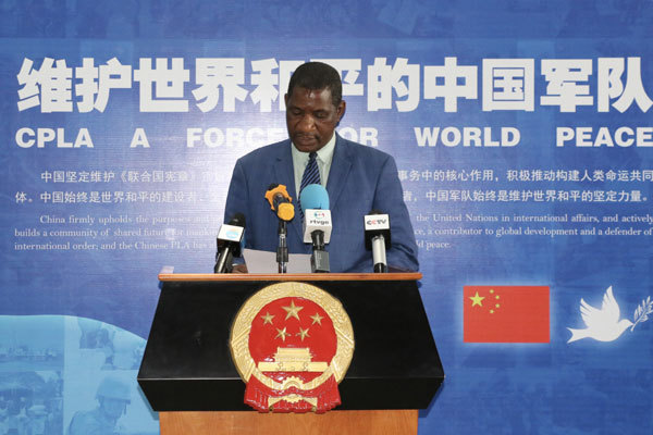 Acting director for AU Peace and Security, Admore Kambudzi, speaks at the opening ceremony of an exhibition "Chinese People's Liberation Army: A Force for World Peace" in Addis Ababa, Ethiopia, on March 18, 2019. [Photo: China Plus]
