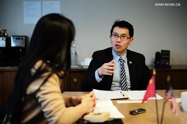 Samuel K. Chueh (R), director of International Business at the Philadelphia Department of Commerce, speaks to Xinhua during an interview in Philadelphia, the United States, March 13, 2019. [Photo: Xinhua]