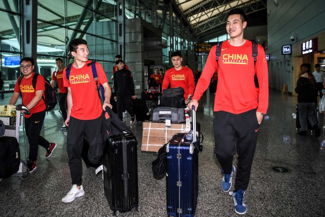 Chinese national basketball squad takes flight to attend the FIBA World Cup Asian Qualifiers in Guangzhou Baiyun Airport on Nov 30, 2018. [File photo: IC]