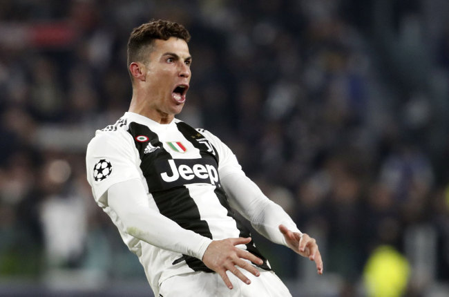 Juventus' Cristiano Ronaldo celebrates after scoring his side's third goal during the Champions League round of 16, 2nd leg, soccer match between Juventus and Atletico Madrid at the Allianz stadium in Turin, Italy, Tuesday, March 12, 2019. [File photo: AP/Antonio Calanni]