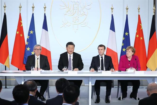 Chinese President Xi Jinping (2nd L), French President Emmanuel Macron (2nd R), German Chancellor Angela Merkel (1st R) and European Commission President Jean-Claude Juncker attend the closing ceremony of a global governance forum co-hosted by China and France in Paris, France, March 26, 2019. [Photo: Xinhua/Ju Peng]