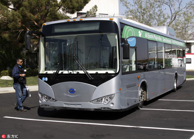 In this May 1, 2013, file photo, an electric bus produced by China's BYD Co., is parked at the announcement of the opening of an electric bus manufacturing plant in Lancaster, Calif. [Photo: IC]