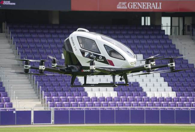 A journalist onboard of an Air Taxi EHANG 216 takes a short flight at Generali Arena in Vienna, Austria, on April 4, 2019. [Photo:AFP/ JOE KLAMAR]