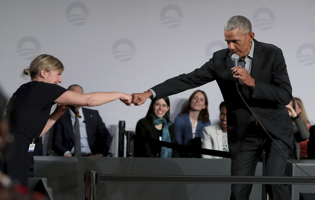 Former US President Barack Obama, right, greets German Green Party member Katharina Schulze, left, during a town hall meeting at the 'European School For Management And Technology' (ESMT) in Berlin, Germany, Saturday, April 6, 2019.[Photo: AP]