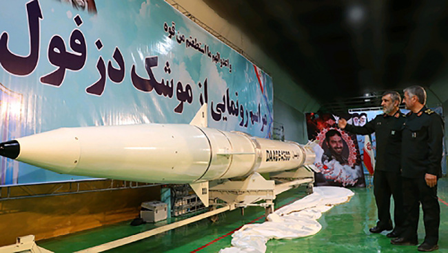 This handout photo provided by Iran's Revolutionary Guard Corps (IRGC) official website via SEPAH News on February 7, 2019 shows IRGC commander-in-chief Mohammad Ali Jafari (R) viewing the new "Dezful" missile, during its inauguration ceremony at an undisclosed location. [Photo: VCG]