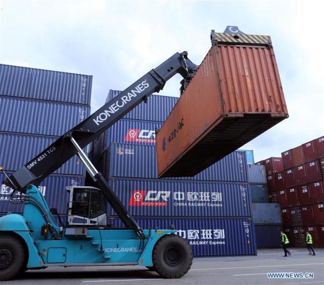 Photo taken on April 16, 2018 shows cargo containers of China Railway Express at Duisburg Intermodal Terminal (DIT) in Duisburg, western Germany. Duisburg, Germany's biggest inland port and one of the important slots of China Railway Express (CRE), has witnessed fruitful results of the Belt and Road Initiative over the past few years and harvested its own urban economic growth. [File Photo: Xinhua]