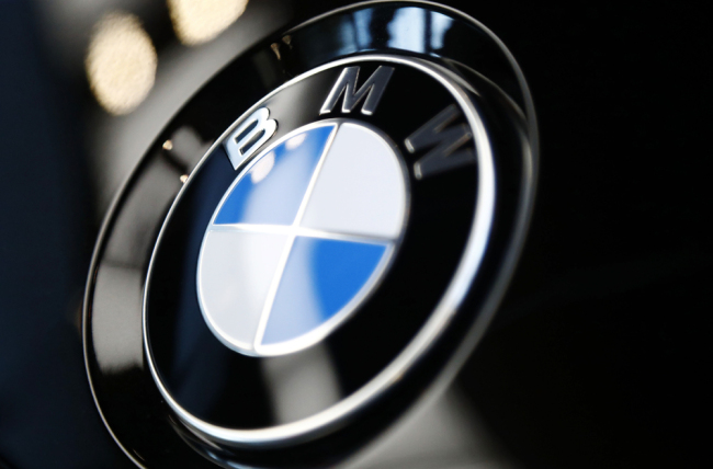 The logo of German car manufacturer BMW is pictured on a BMW car prior to the earnings press conference in Munich, Germany, March 20, 2019. [Photo: AP/Matthias Schrader]