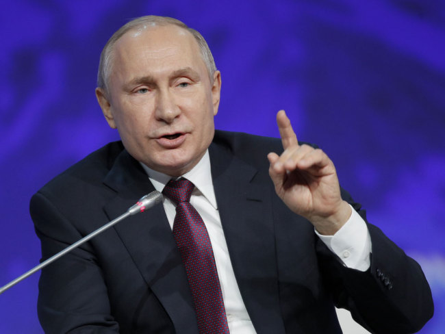 Russian President Vladimir Putin gestures while speaking at a plenary session of the International Arctic Forum in St. Petersburg, Russia, Tuesday, April 9, 2019. [Photo: AP/Dmitri Lovetsky]