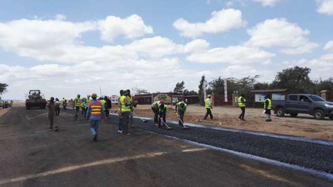 Workers at the construction site for the C12 Highway in Kenya. [Photo: China Plus]